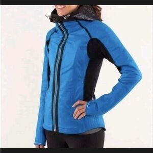 Lululemon blue and black zip up jacket. With removable hood. Fabulous ! Size 6